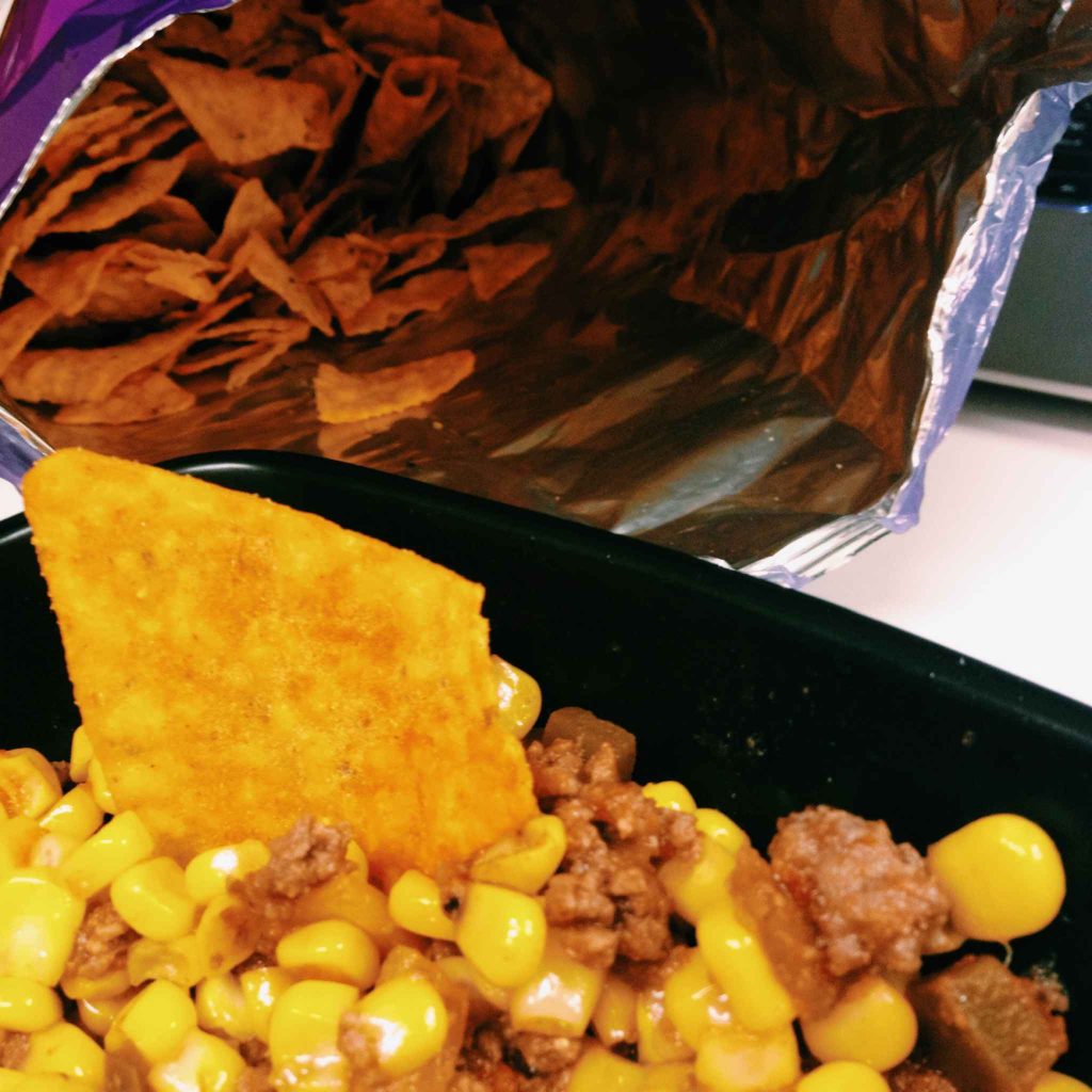 Chips and dip... ground beef, corn and salsa dip that is...